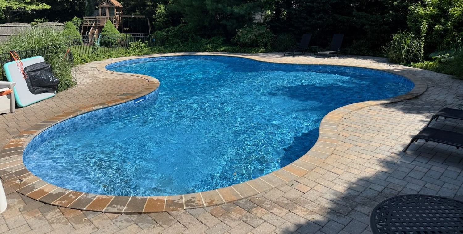 A finished pool in a Long Island backyard