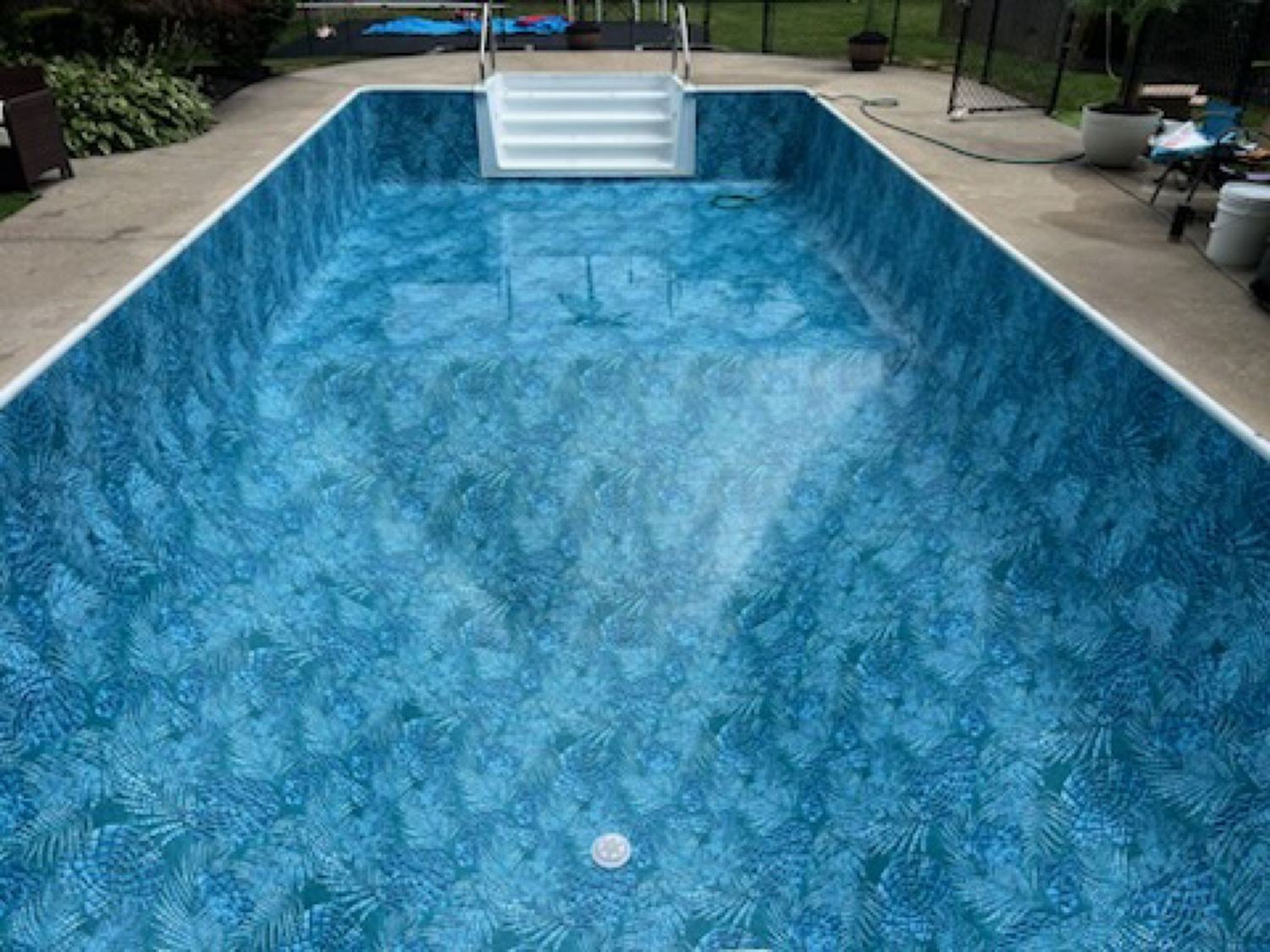 Crisp blue water over a new pool liner